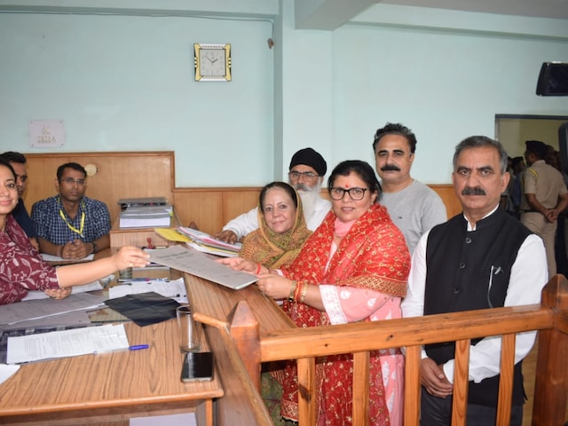 File photo of Kamlesh Thakur with her husband and Himachal Pradesh CM Sukhvinder Singh Sukhu, while filing her nomination for Dehra bypoll. (Image: X/kamlesh_thakur)