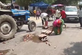 The chaotic scene was captured in a viral video on social media, showing people scrambling to grab bottles of liquor amidst the commotion.